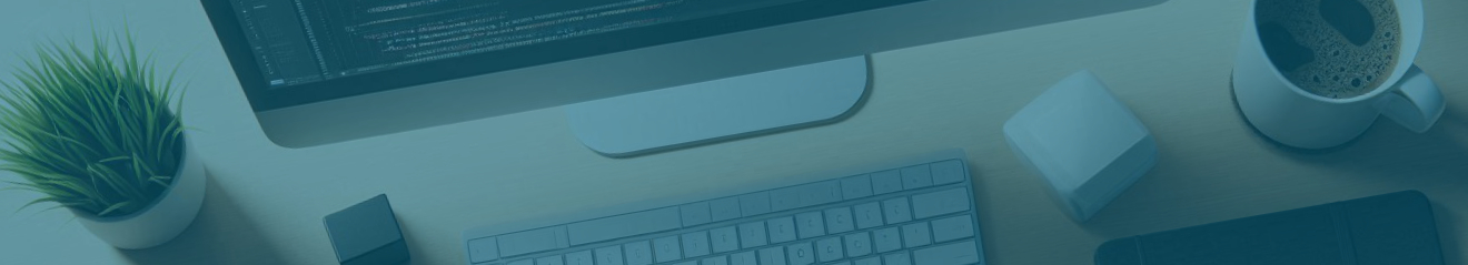 Desk image with a computer and a coffee mug