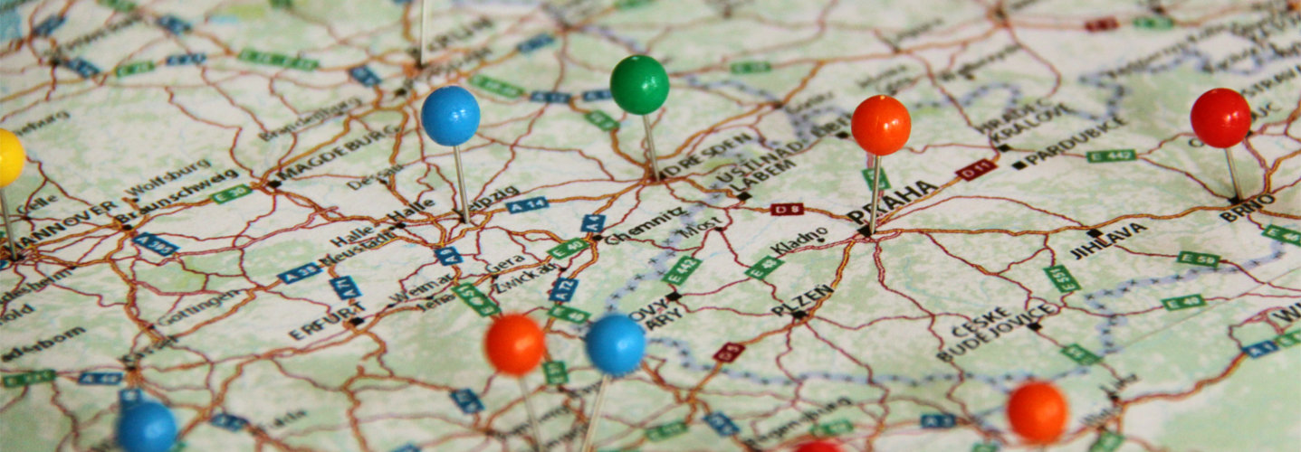 Background image showing a map for news and upcoming events.